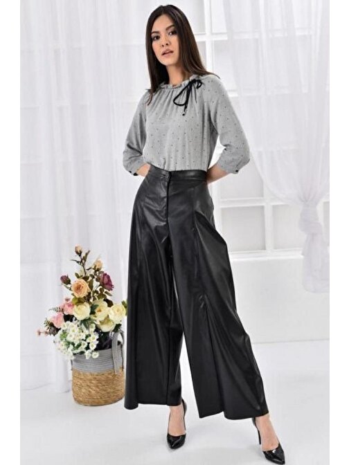Bol Paça ve Yırtmaçlı Siyah Kadın Deri Pantolon